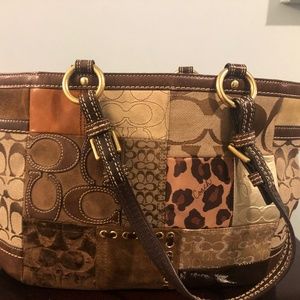 Coach brown animal print pocket book